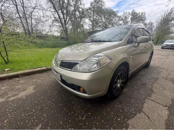 Продам отличный Nissan Tiida C11 (чистый Японец)Покупался с салона 1 владелец (Мать) Донецк