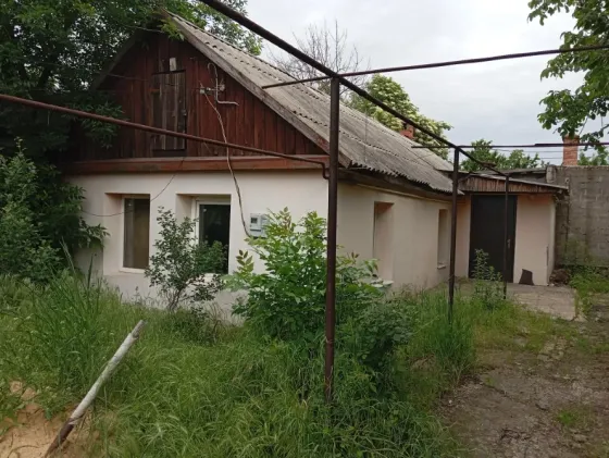 Продажа дома в Донецке площадью 57м2. на земельном участке 5,5 сот. в Калининском р-не Донецк