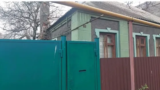 Срочно продается торг газифицированный дом 74 кв.м и 2хэтажный бокс гараж Партизанский проспект Донецк
