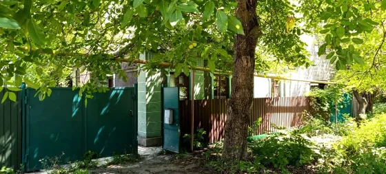 Срочно продается торг газифицированный дом 74 кв.м и 2хэтажный бокс гараж Партизанский проспект Донецк