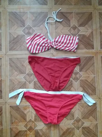 продам купальник красный из трех элементов р. 48-50 Донецк