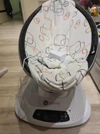 Продам укачивающий центр 4moms Донецк