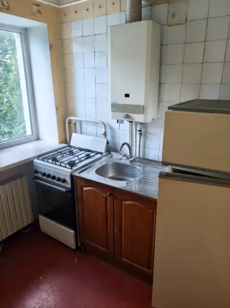 продам 2 к.кв. ленинский р. кирова стоматол. 2900 мил р. кирпич торг.. Донецк