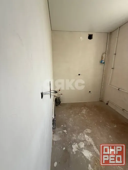 Продается 2-комнатная квартира общей площадью 49,2 м² в Центральном районе Мариуполь - изображение 2