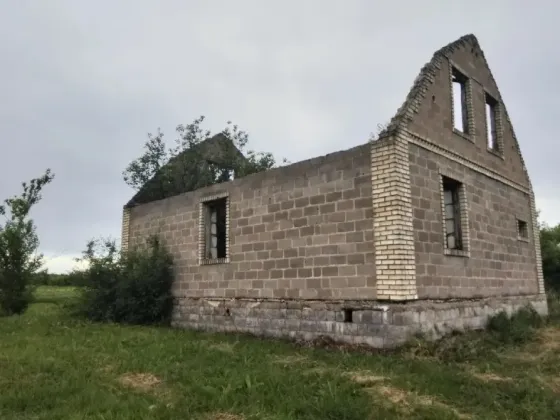 Продам недостроенный дом на участке ижс Донецк