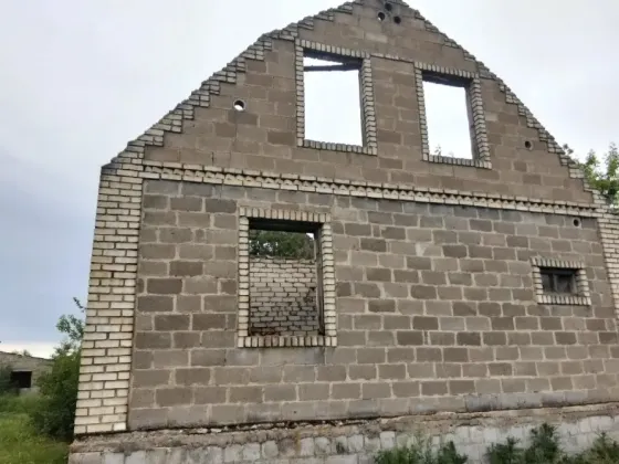 Продам недостроенный дом на участке ижс Донецк