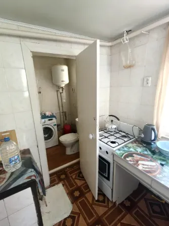Продаётся отдельностоящий большой 4-х комнатный дом с флигелем возле Жд вокзала в Киевском районе Донецк