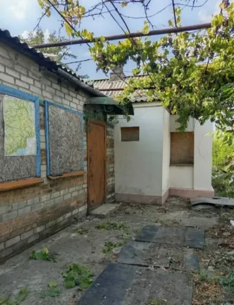 Дом,4 сотки приватизированной земли 850000 Донецк