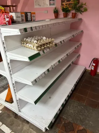 Продаю двусторонний торговый стеллаж (островной тип) для продуктового магазина. Донецк