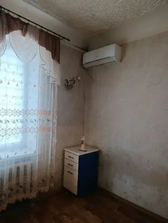 Продам обустроенную комнату,центр Донецк