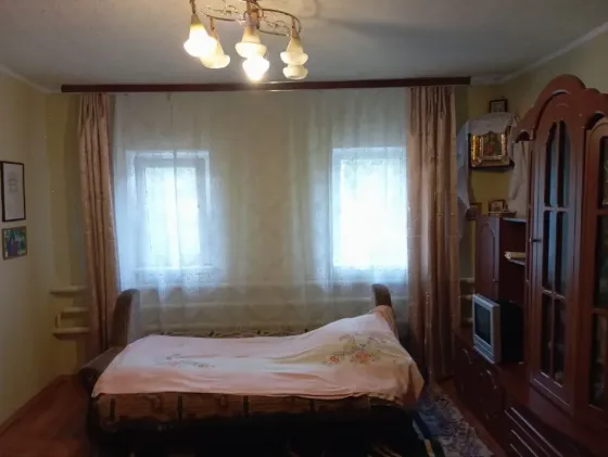 Продам дом с участком 25соток .Кировский район .пос.Ясиновка Макеевка