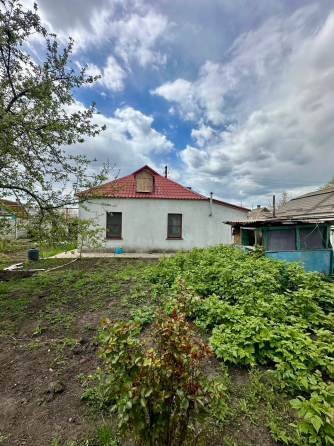 Продается дом с приватизированной землей в Ленинском Донецк