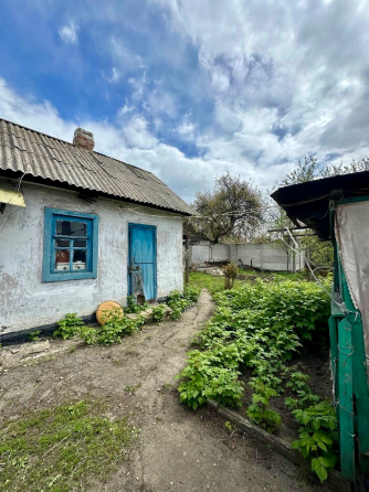 Продается дом с приватизированной землей в Ленинском Донецк
