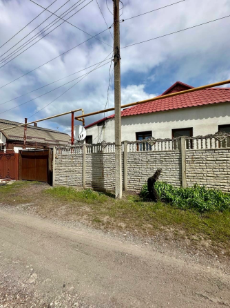 Продается дом с приватизированной землей в Ленинском Донецк