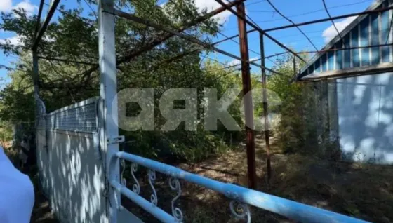 Продаётся просторный дом с коммуникациями, садом и огородом в селе Кириловка Мариуполь