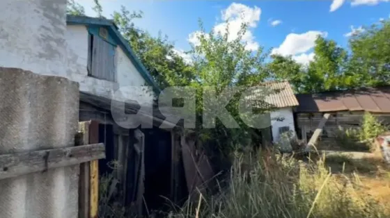 Продаётся просторный дом с коммуникациями, садом и огородом в селе Кириловка Мариуполь