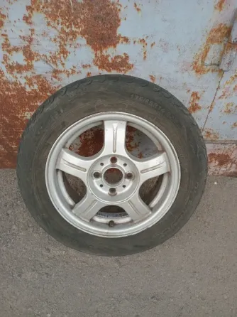 Продаю колесо в сборе на приору,оригинальное,р 14 Донецк