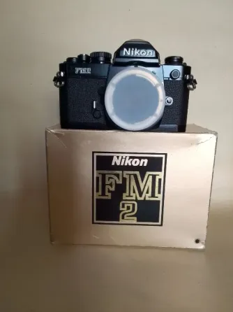 Пленочный фотоаппарат Nikon FM2 и два объектива : Nikon F 50mm, f/1.8; Soligor 28-105mm, f/3,5x4,5mm Донецк