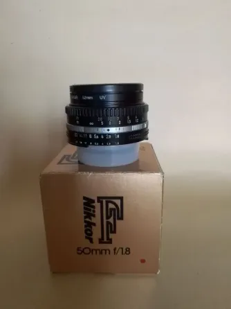Пленочный фотоаппарат Nikon FM2 и два объектива : Nikon F 50mm, f/1.8; Soligor 28-105mm, f/3,5x4,5mm Донецк