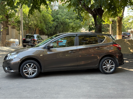 Nissan Tiida 2015 1.6 автомат пробег 95 Донецк