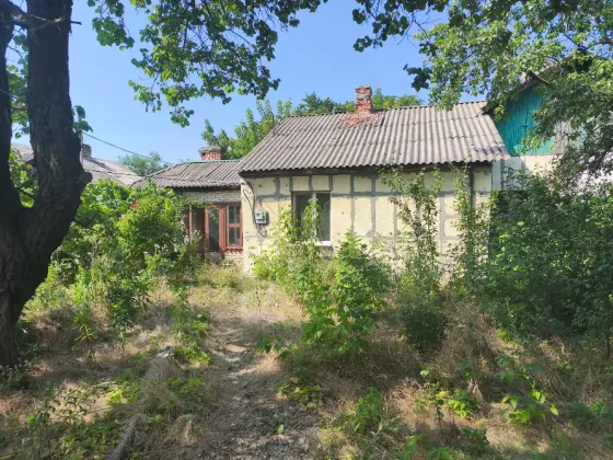 Продам квартиру на земле в р-не 55 квартала Макеевка