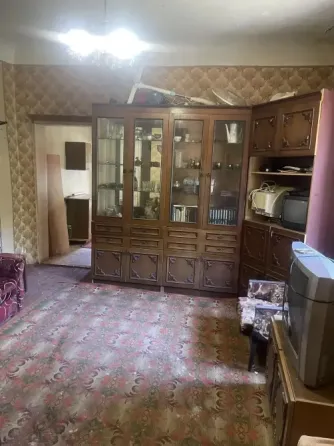 Продам 2 ком. кв-ру на земле Гвардейка, ориентир Орджоникидзе. Макеевка