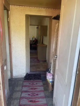 Продам 2 ком. кв-ру на земле Гвардейка, ориентир Орджоникидзе. Макеевка