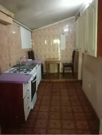 Продам 2к. квартиру на земле Ленинский р-н Донецк