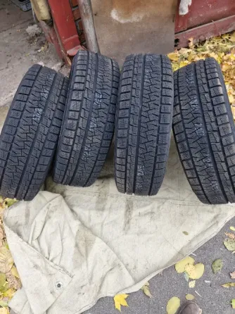 Продам комплет зимних шин 205/60/16 Донецк