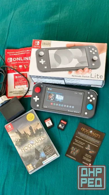 Продам Nintendo switch Lite + 2 игры Макеевка - изображение 1