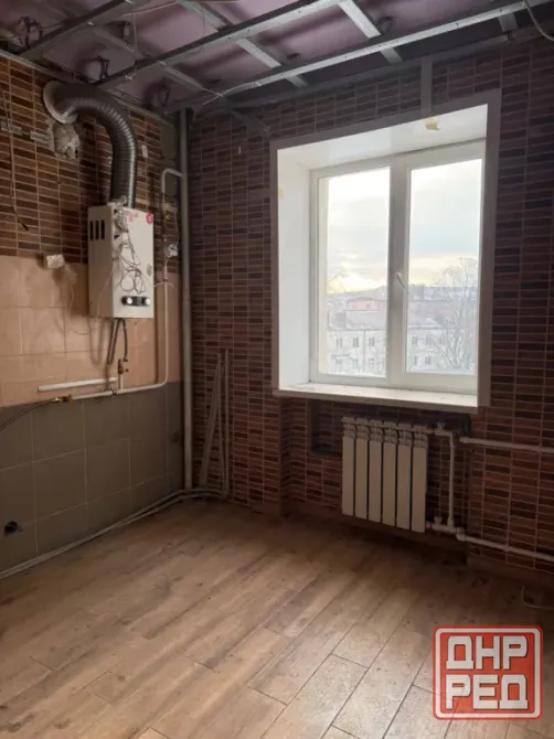 Продается 1-комнатная квартира в Центральном районе Мариуполь - изображение 2
