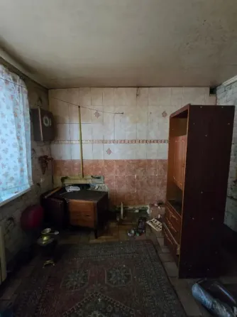 Продам газифицированный дом под капремонт, Гвардейка, центр, ул. Малиновского, ориентир 5-й угол. Макеевка