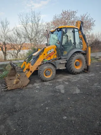 Услуги экскаватора погрузчика JCB 3CX Донецк