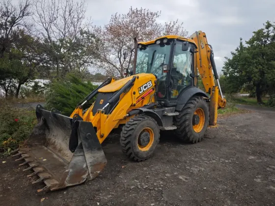 Услуги экскаватора погрузчика JCB 3CX Донецк