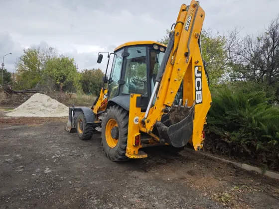 Услуги экскаватора погрузчика JCB 3CX Донецк