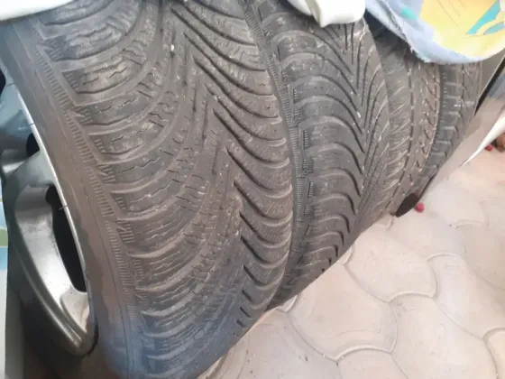 Продам комплект колес,зимняя резина,титановые диски.4шт. Мариуполь