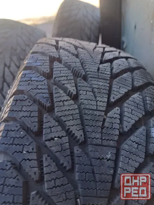 Продам новую зимнюю резину Кордиант 185 / 65 r15 на новых стальных дисках . Разболтовка 4*114,3 Донецк - изображение 1