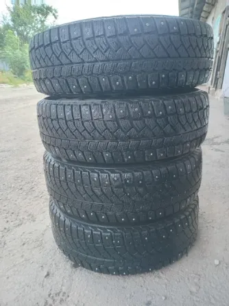Продаю комплект зимней резины 185 70 14 Донецк