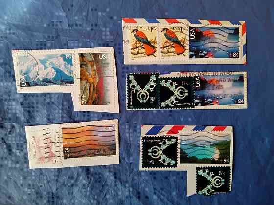Почтовые марки Канады и США . Б/У - вырезанные с конвертов . Макеевка