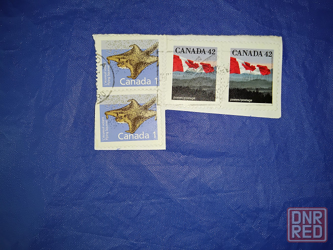 Почтовые марки Канады и США . Б/У - вырезанные с конвертов . Макеевка - изображение 1