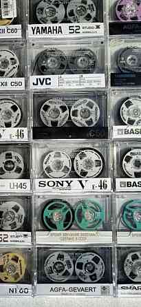 Новые аудиокассеты с катушечками с логотипами разных известных брендов. Донецк