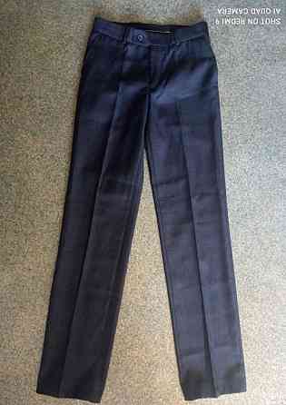 школьные брюки серого цвета в идеальном состоянии на рост 164-170 см Донецк