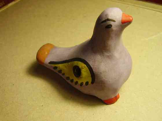 Детская игрушка музыкальная свистулька Птичка с крылышком из глины Донецк