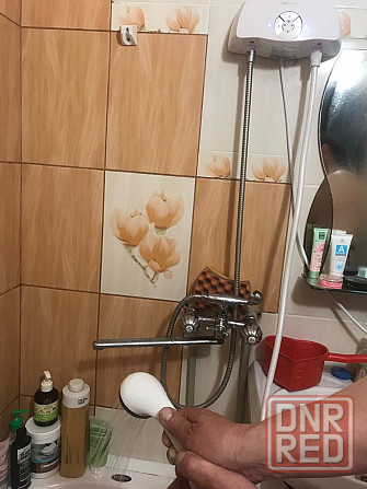 Продам новый проточный водонагреватель-душ Электролюкс,товар с документами сертифицирован Донецк - изображение 1
