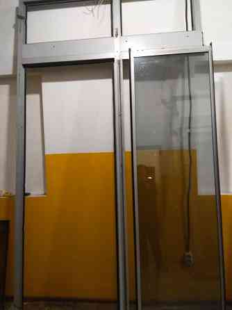 двери -блок в алюминиевом профиле с электроприводом Макеевка