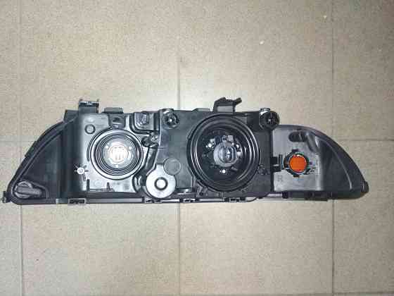 Фара правая BMW E39 (с желтым поворотом) TYC 20A379052B Донецк