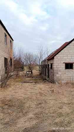 Продам участок с недостроенным домом в селе Республика Володарского района Мариуполь