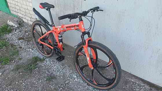 Новый двухподвесной горный велосипед со складной рамой на литых дисках и дисковых тормозах Енакиево