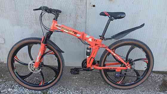 Новый двухподвесной горный велосипед со складной рамой на литых дисках и дисковых тормозах Енакиево