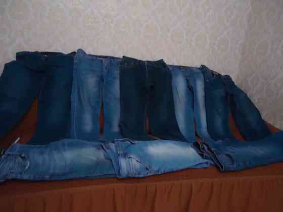 одежды мужские брюки джинсы размер от 48 до 54 по 500 р а Свитеры рубашки разные цены200р-400р Донецк